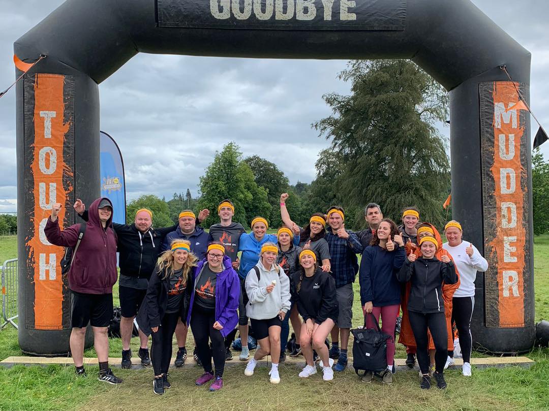 Group photo of tough mudder participants