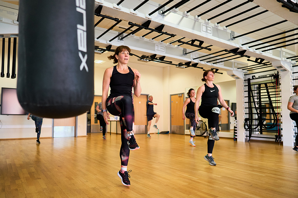 two people exercising in a fitness class