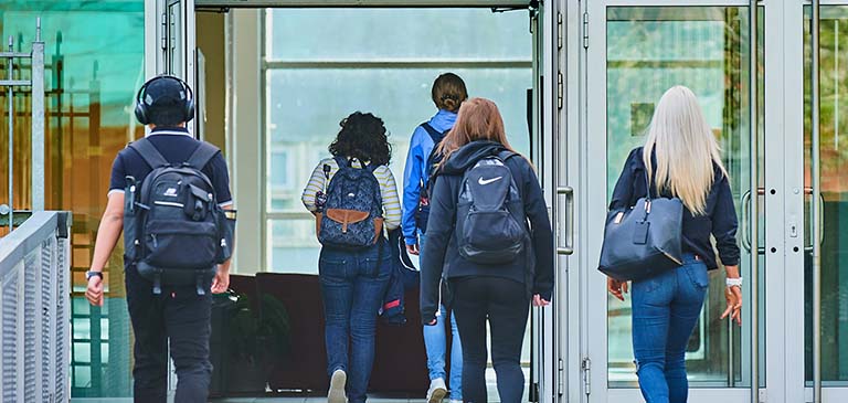 Students walking into Goodlyburn campus