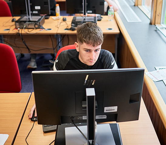 student looking at computer screen