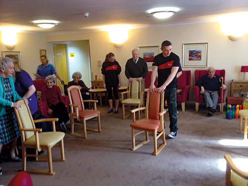 Sports Students Helping the Elderly in Care Homes