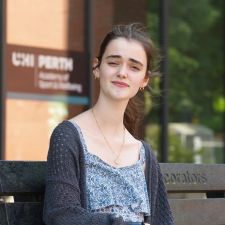 emily outside the asw on a bench
