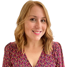 headshot of kate wearing a floral red top