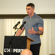 jack parr giving a speech at prizegiving on stage