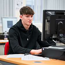 student working on a computer