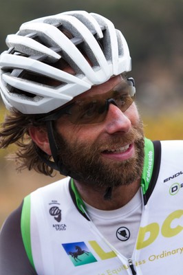 Mark Beaumont wearing cycle helmet