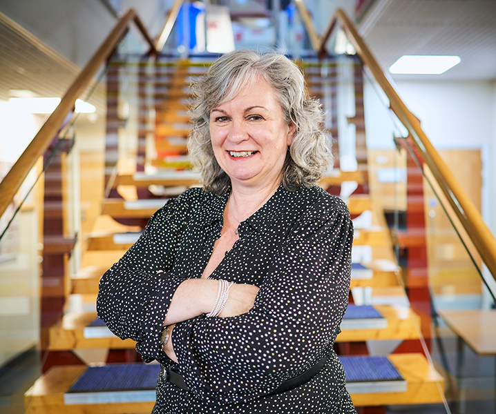 margaret standing at the bottom of the library steps