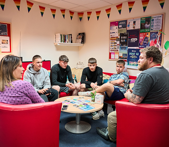 students in the hub chatting to nicola and alex