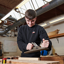 student in the wood workshop