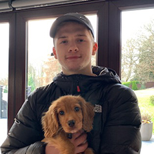 sam holding his dog