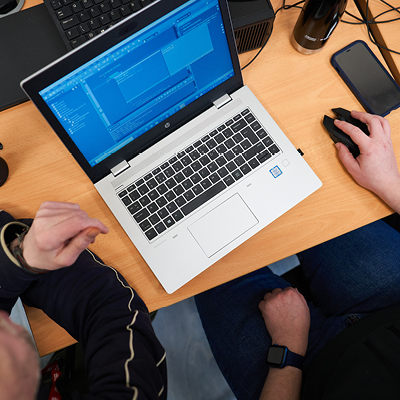 overhead view of student using a laptop