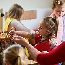 children playing with their support worker