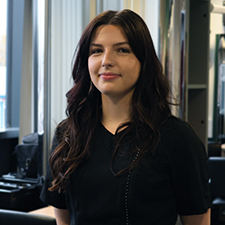 Erin in the salon on campus