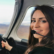 student alison flying an aeroplane