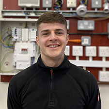 ross standing in the workshop