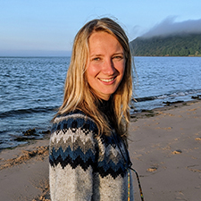 catriona standing outside on a beach