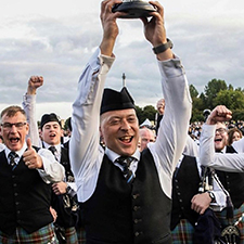 ross holding up the piper trophy