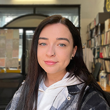 dayna wearing a checked jacket