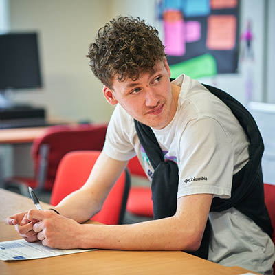 New Opportunities student in class