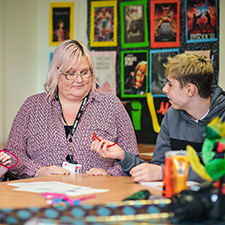 student and lecturer in classroom