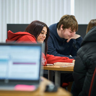New Opportunities student in class