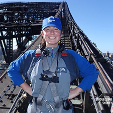 melissa at the top of a bridge