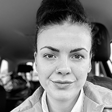 black and white shot of Jessica in a car