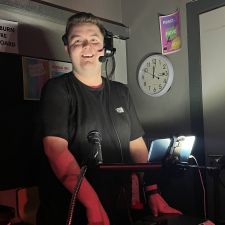 cameron behind the scences in the theatre on campus