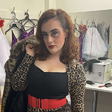 megan dressed up in a leopard print outfit for a theatre show